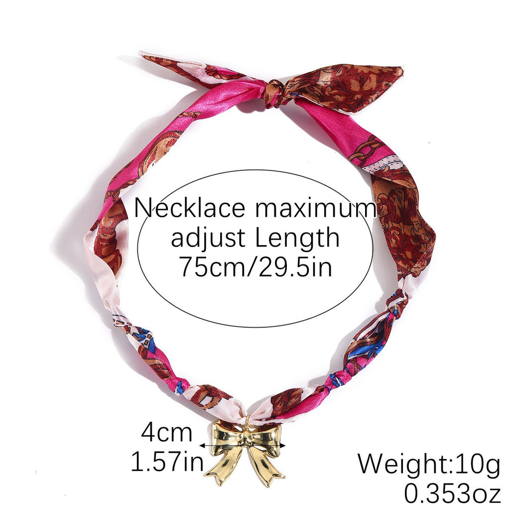 Boho Pink Scarf Necklace Gold Bow Pendant Adjustable Statement Necklace NIB